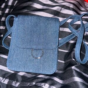 S/M Denim Crossbody. BRAND NEW NEVER WORN! Lmk if you're interested